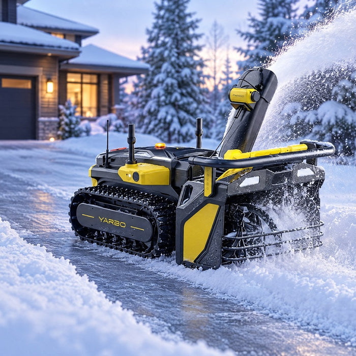 Yarbo robot snow blower clearing a snowy suburban driveway at dawn