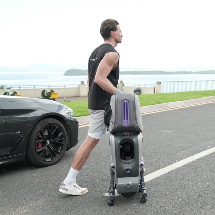 Player wheeling the AceiiLab A1 tennis robot to the court like a suitcase