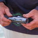 Angler holding CanFish CamX before deployment