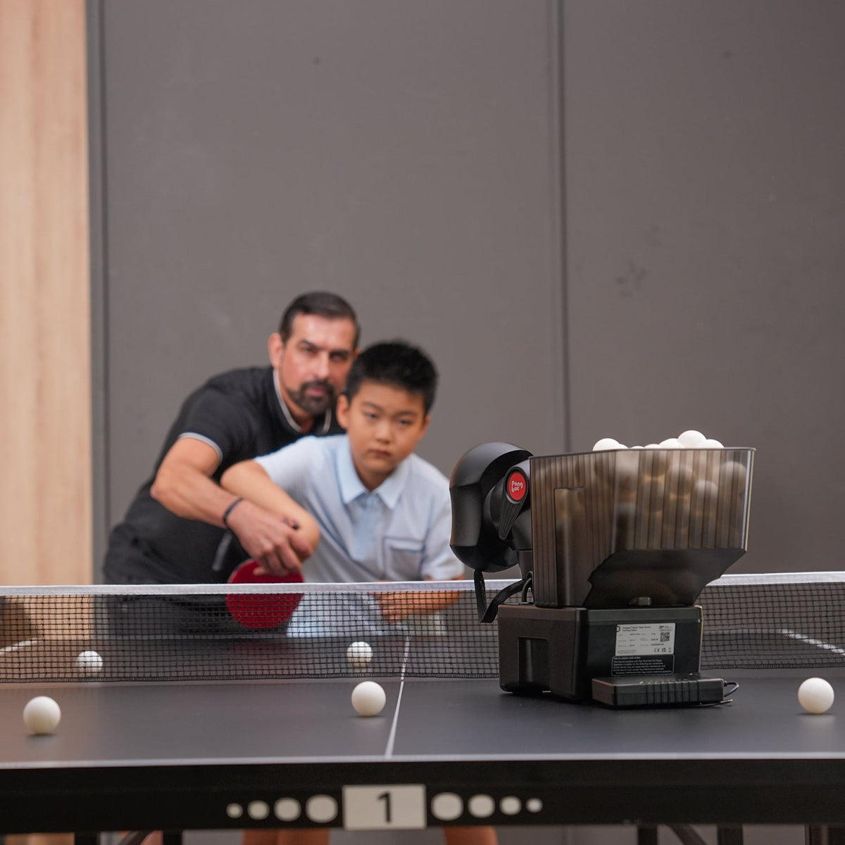 Pongbot Nova S Pro table tennis robot in use