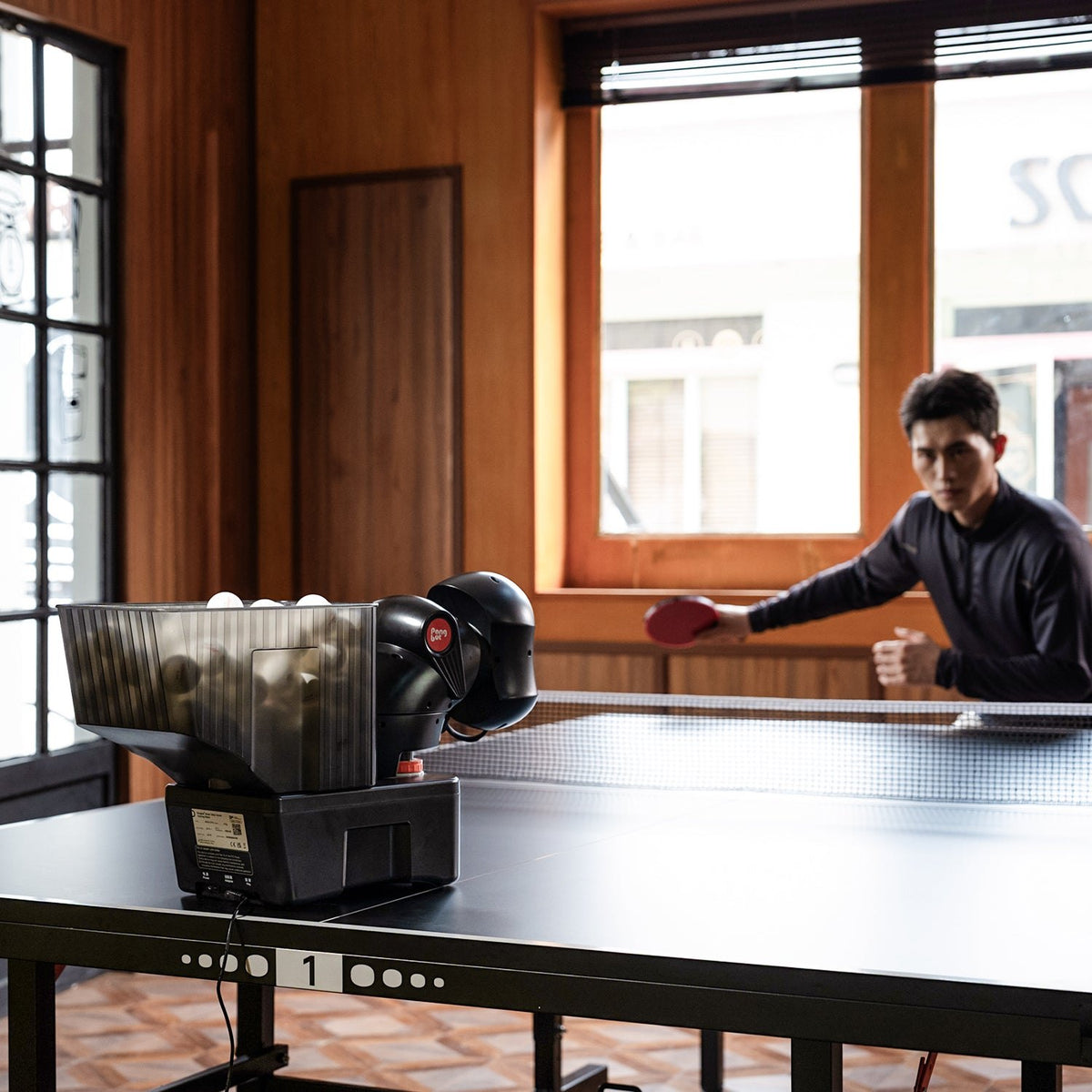 Pongbot Nova S Pro table tennis robot in use