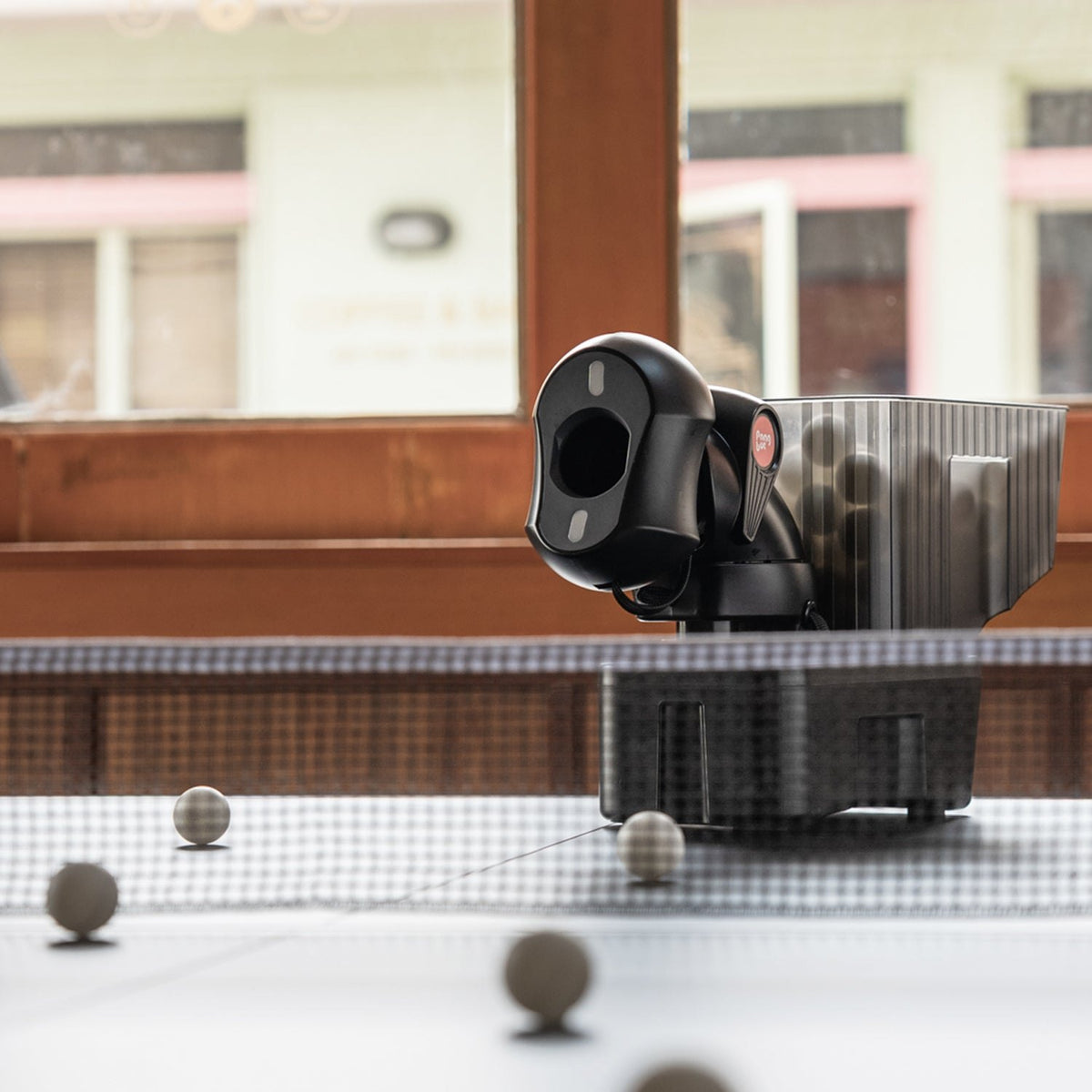 Pongbot Nova S Pro table tennis robot in use