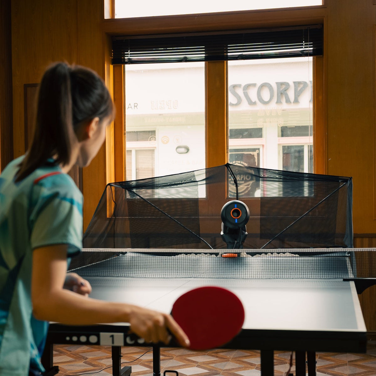 Pongbot Omni S Pro table tennis robot in use