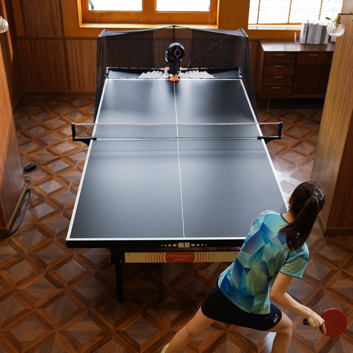 Pongbot Omni S Pro table tennis robot in use