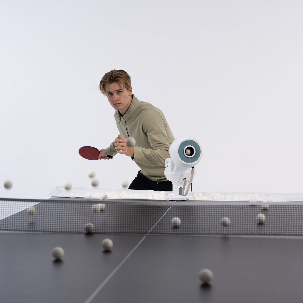 Pongbot Omni S Plus table tennis robot in use